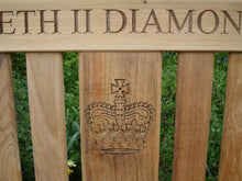 Load image into Gallery viewer, English Crown carved into wood on a commemorative bench - 4mb1704