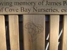 Load image into Gallery viewer, Carnation flower carved into wood on a memorial bench - 4mb2950