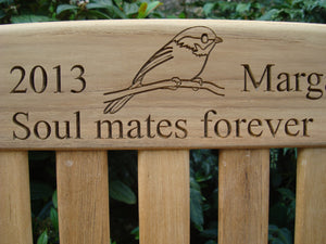 Robin carved into the wood of memorial bench - 4mb2992