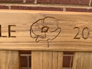 Poppy carving to wood