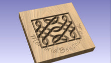 Load image into Gallery viewer, Celtic knot carved into wood on a memorial bench