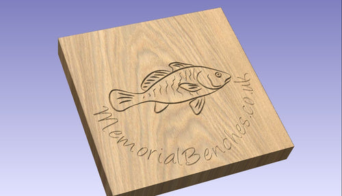 Engraved fish on a memorial bench